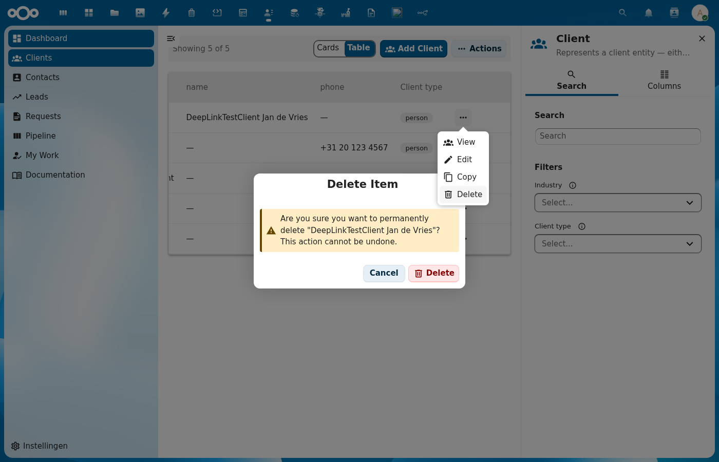CnDeleteDialog confirmation dialog with warning text and Cancel/Delete buttons